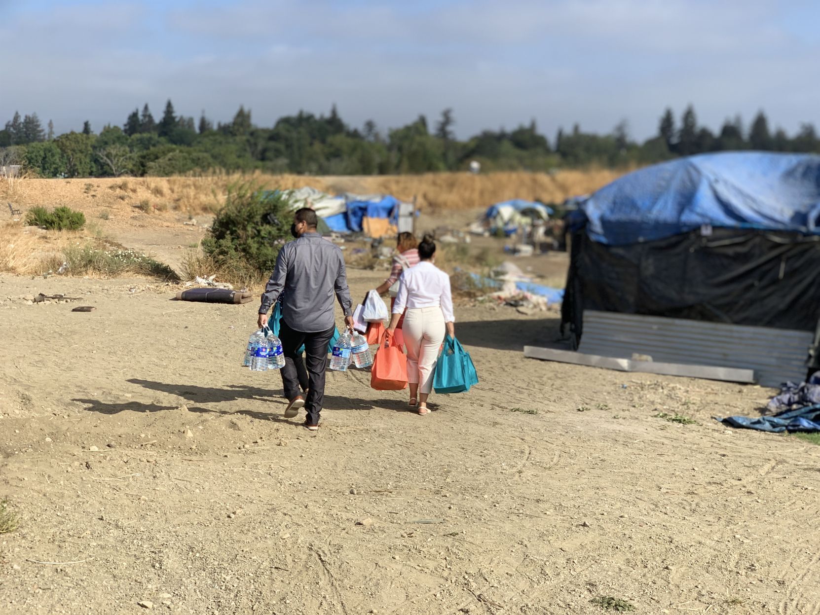 OLE Health distributes care bags to residents of the Bowl